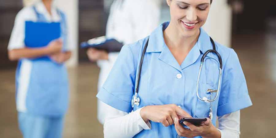 Nurse takes a quick break to check her social media accounts